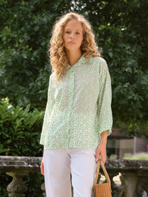 Blusa ricamata con stampa all-over