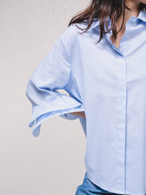 Blusa a righe con volant rinforzati