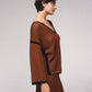 Maglione in maglia traforata con dettagli a contrasto e scollo a V