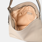 Borsa a spalla in pelle sintetica con tracolla e fibbia a contrasto