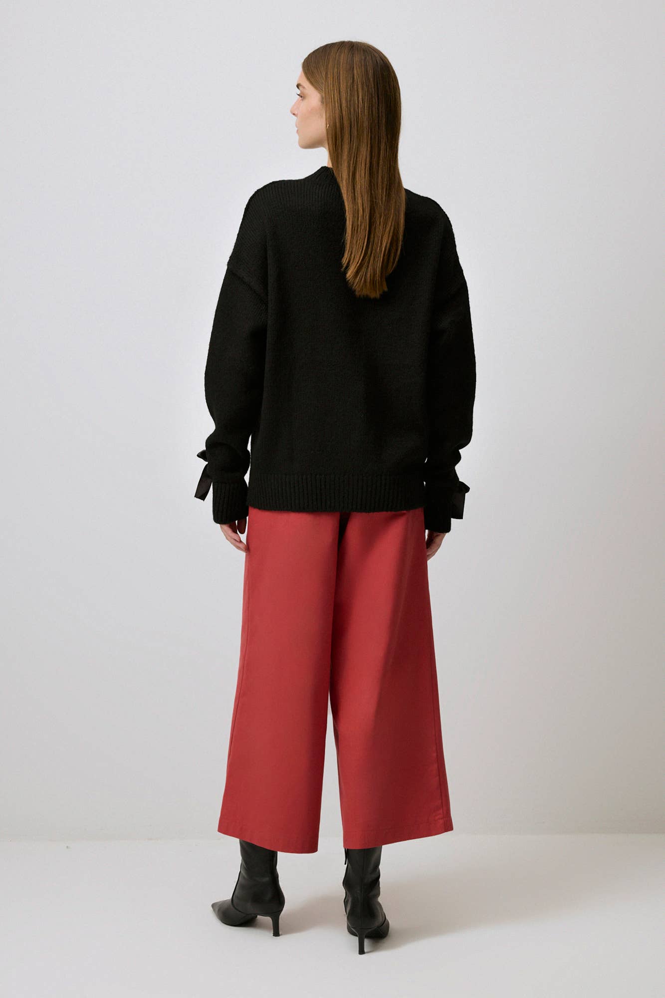 Maglione in maglia con fiocchi