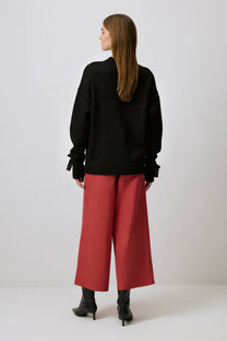 Maglione in maglia con fiocchi