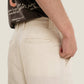 Pantaloni in lino a gamba dritta color crema