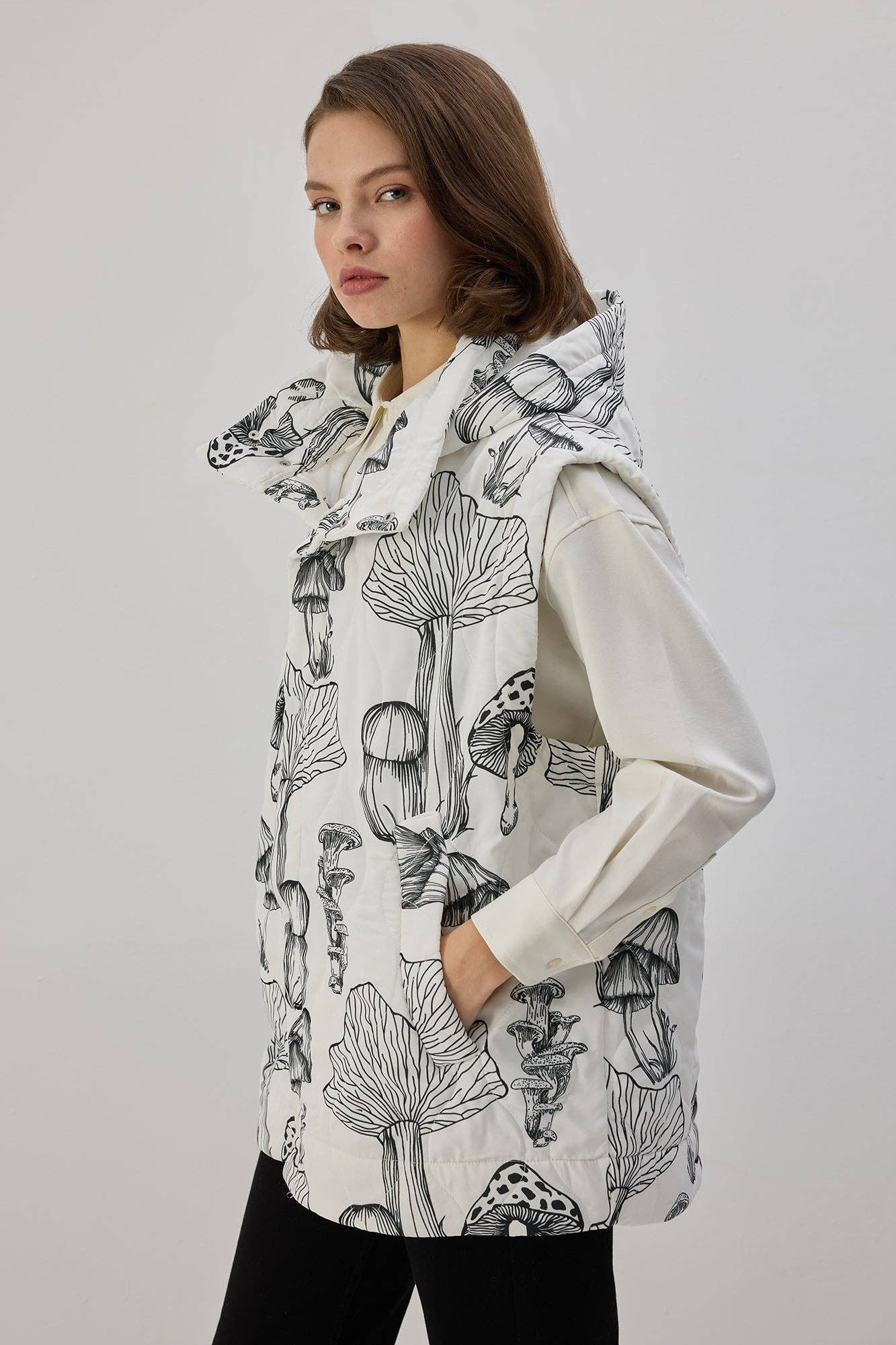 Gilet imbottito con cappuccio