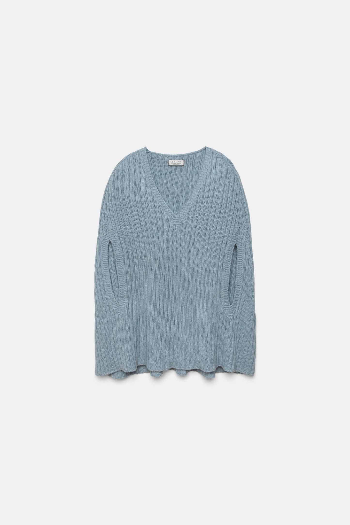 Poncho a coste con scollo a V