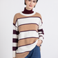 Maglione oversize a righe con collo alto