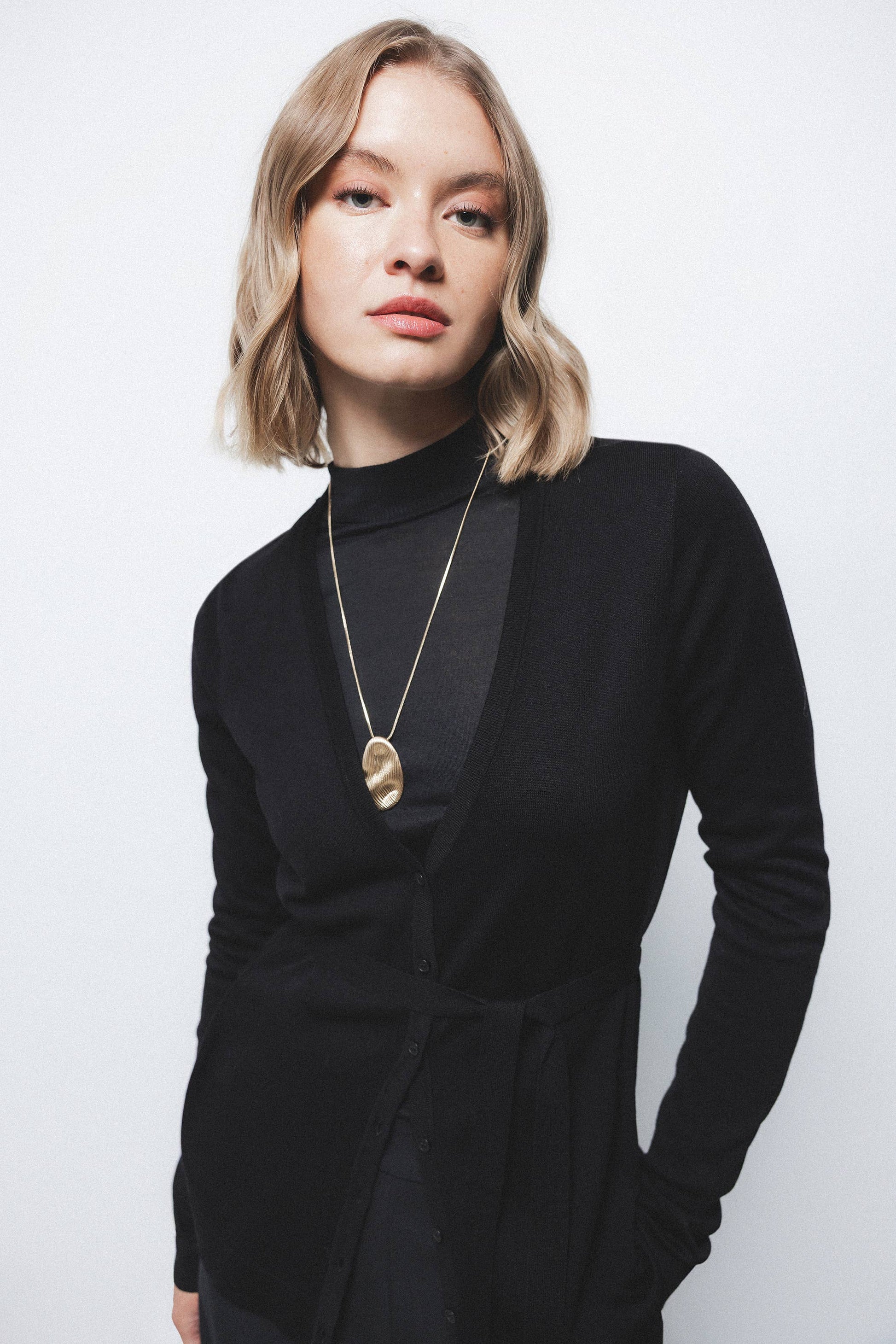 Cappotto cardigan in maglia liscia con cintura