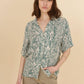 Blusa Clara a maniche corte con stampa zebrata