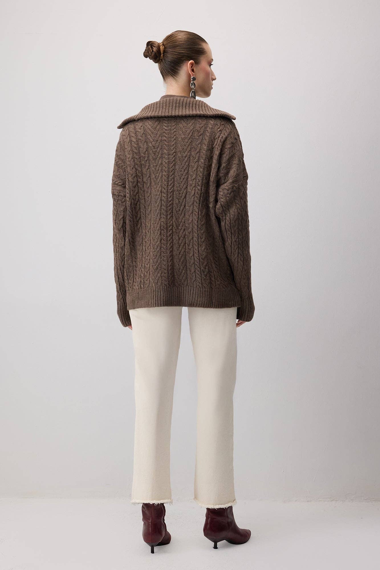 Maglione in maglia a trecce con zip e colletto ampio