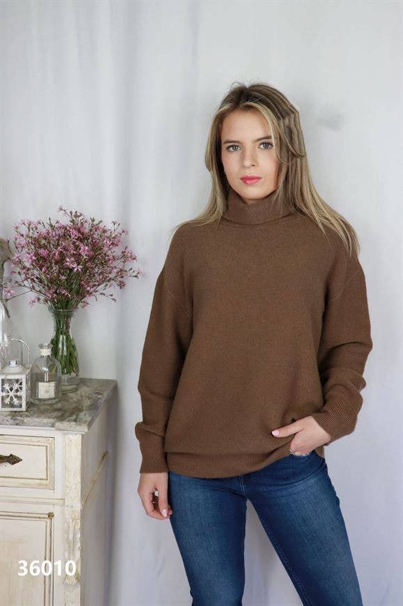 Maglione a collo alto in maglia con maniche aderenti