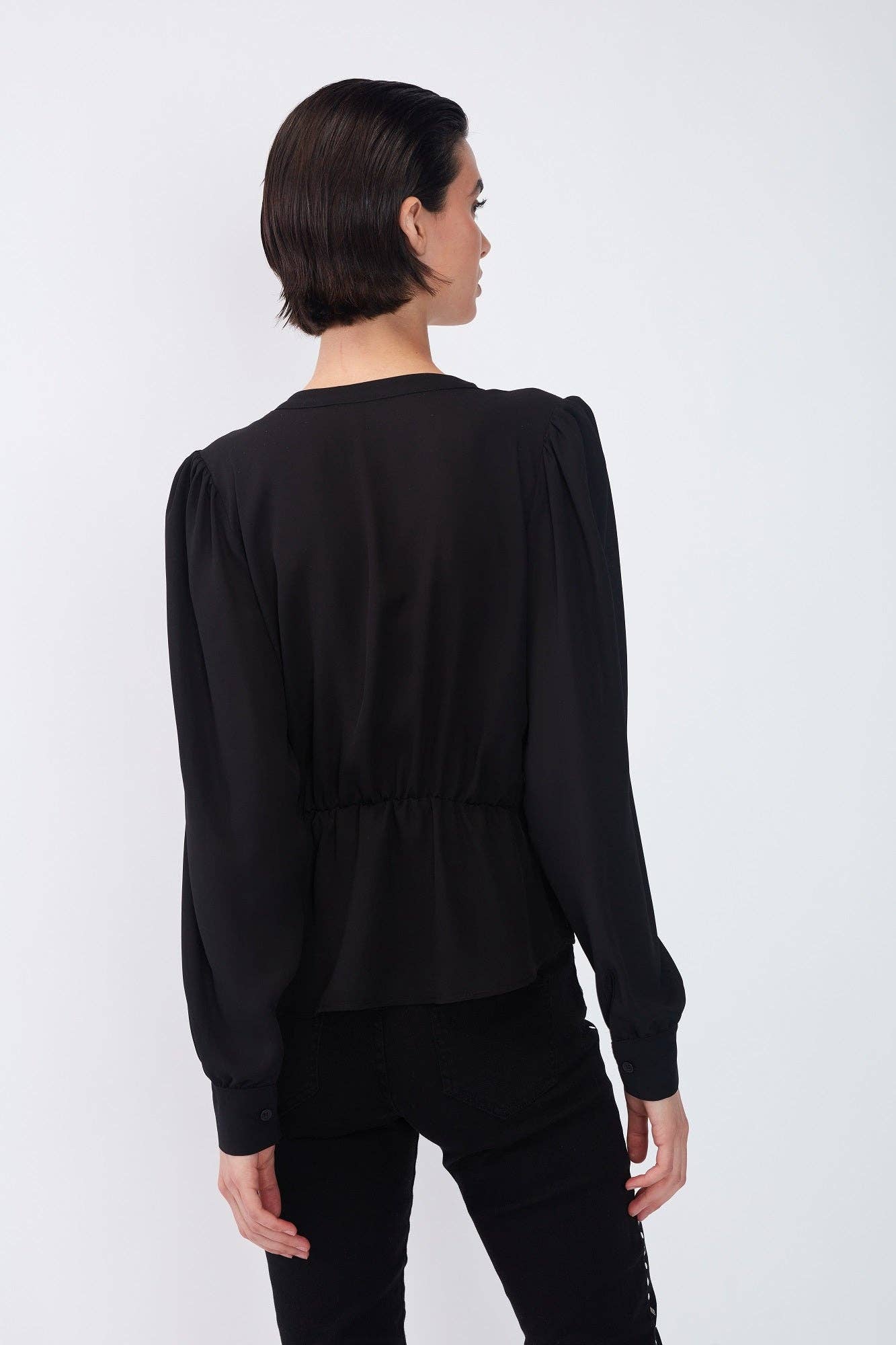 Blusa tinta unita con pieghe