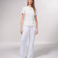 T-shirt basic aderente con catena dorata