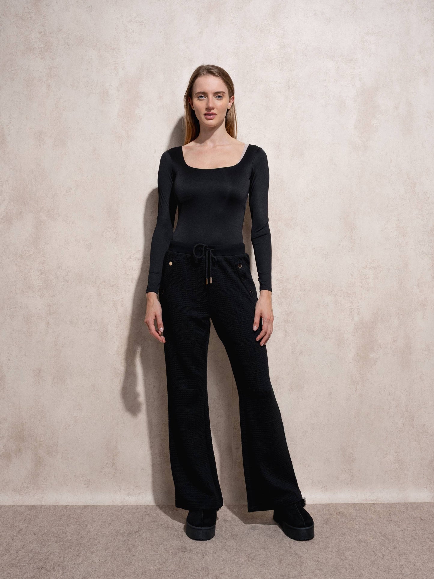 Pantaloni jogger in tessuto matelassé con coulisse