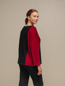 Maglia donna color block con bottoni ai polsi