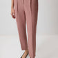 Pantaloni rosa a righe con pieghe