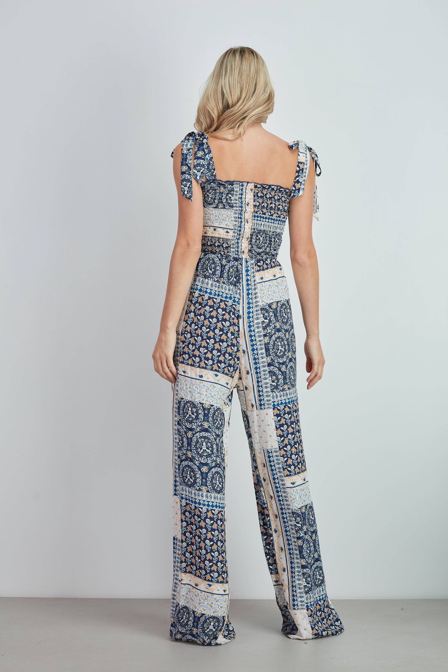 Tuta lunga patchwork con vita elasticizzata
