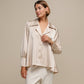 Tunica satinata oversize con bottoni