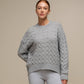 Maglione donna in maglia a trecce con filo luminoso