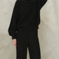 Maglione girocollo a costine in misto cashmere con maniche a palloncino