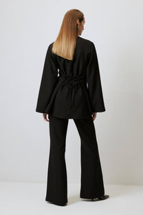 Blusa in crêpe con incrocio