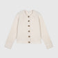 Cardigan in maglia calda écru con bottoni effetto corno