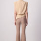 Blusa asimmetrica beige con pieghe sulla spalla