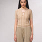 Top in maglia lurex con cut-out frontale