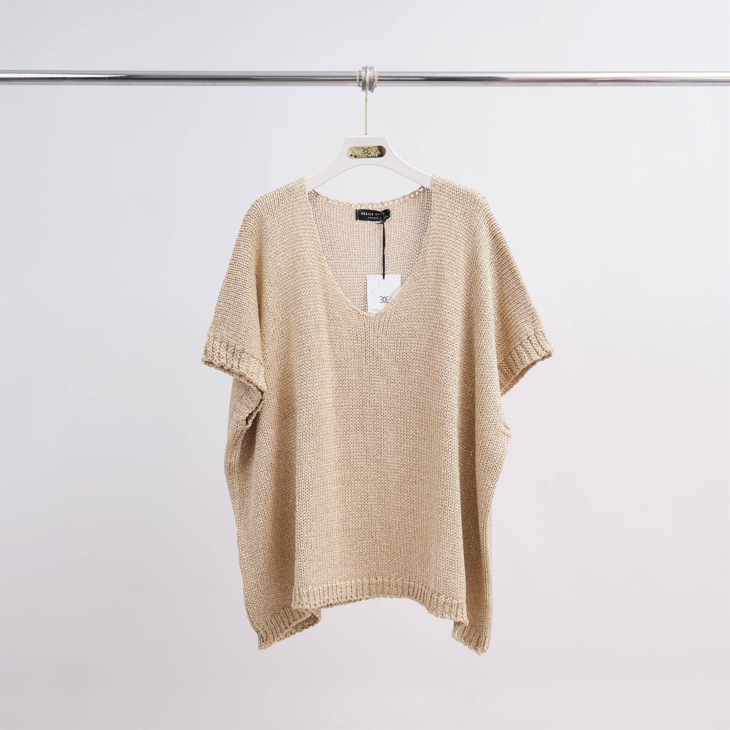 Maglione corto in maglia metallizzata con maniche corte