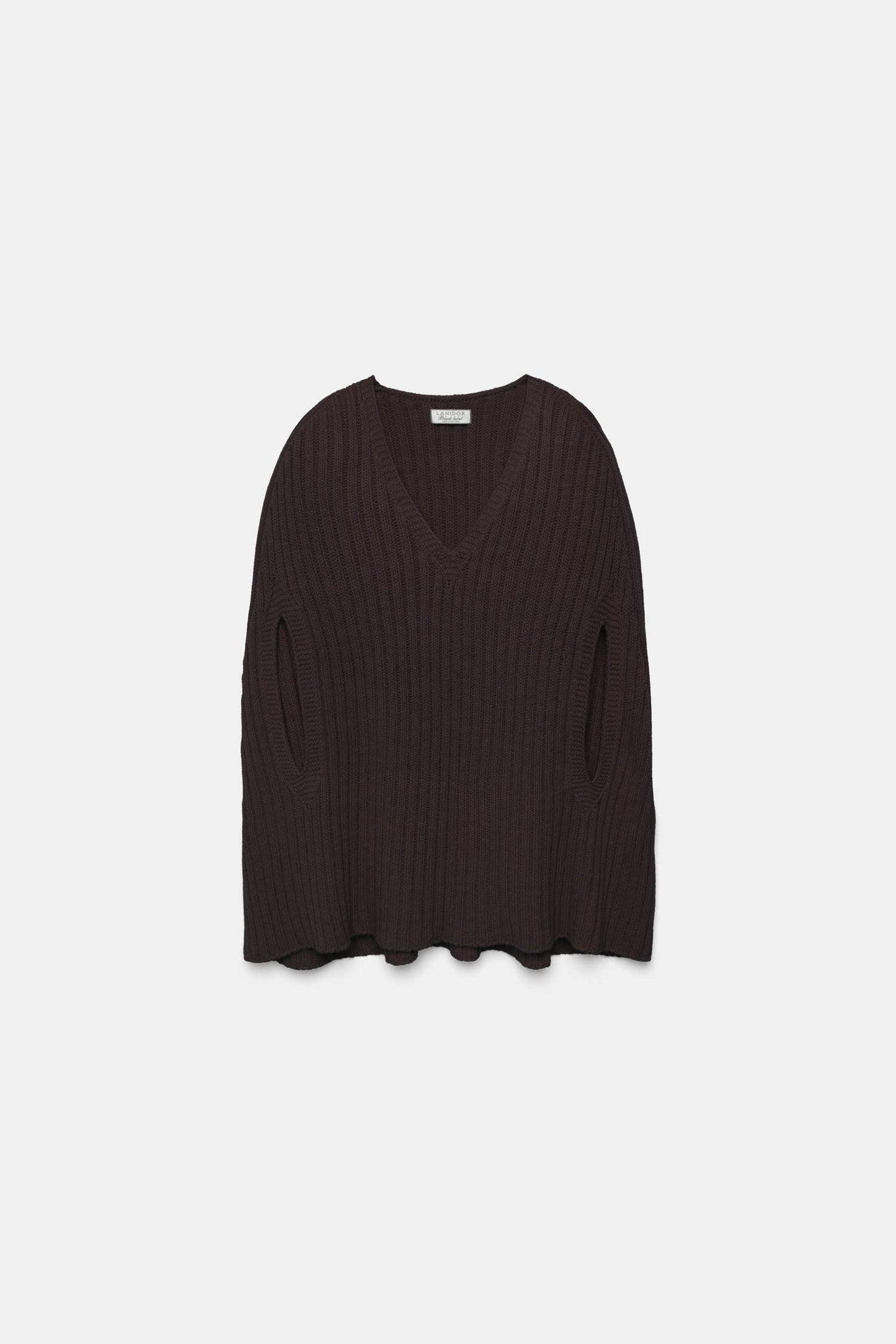 Poncho a maglia a coste con scollo a V