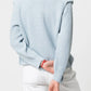 Maglione in maglia con trecce e spalle strutturate