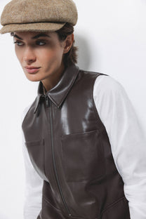 Abito corto in ecopelle con zip e colletto