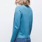 Maglione in maglia rasata con scollo a V e fiocco