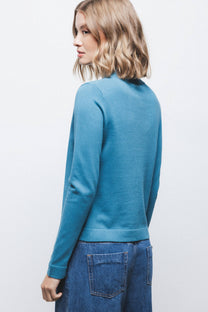 Maglione in maglia rasata con scollo a V e fiocco