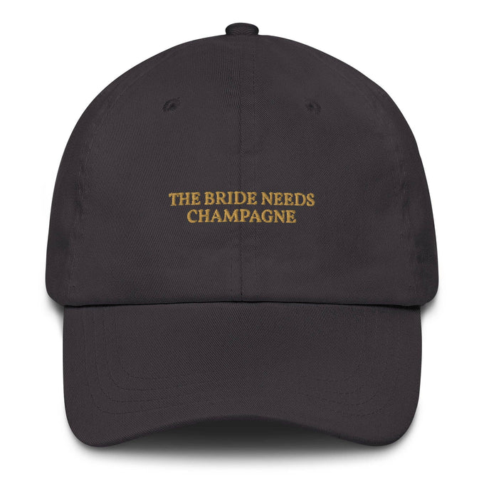 Cappellino dad hat ricamato “The Bride Needs Champagne”
