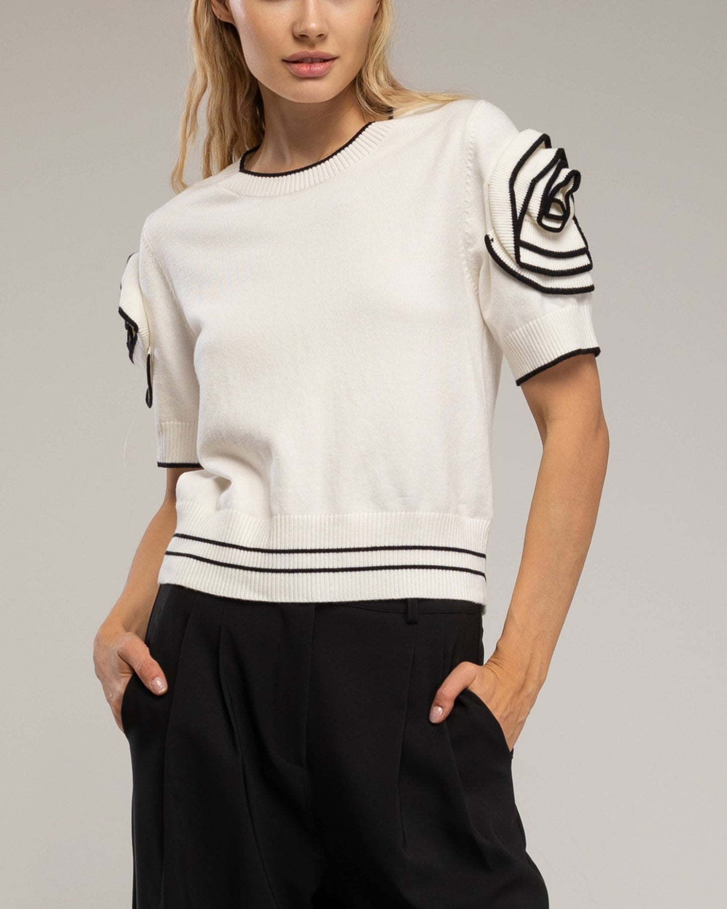 Top in maglia cropped con spalline