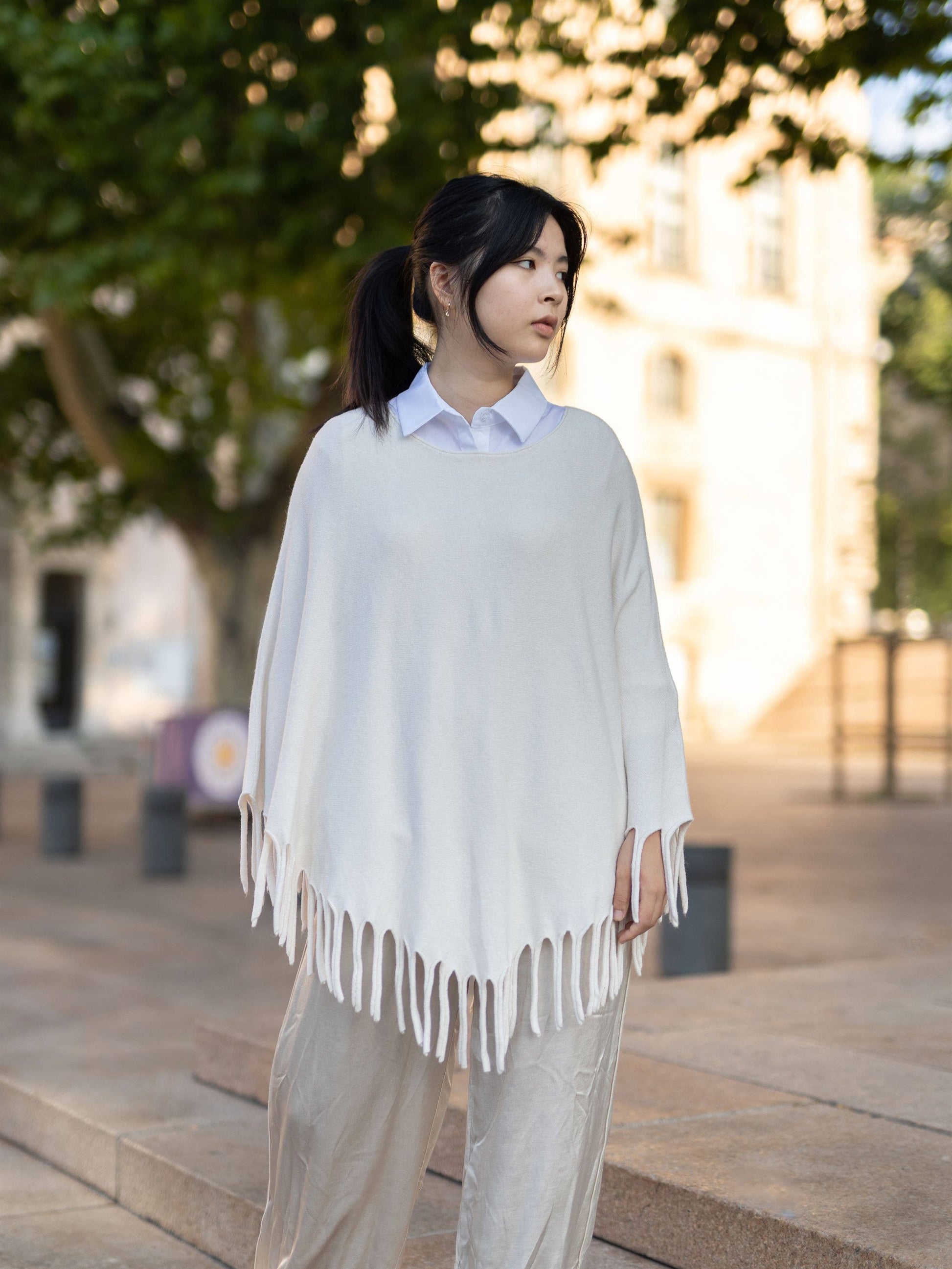Poncho con frange morbido
