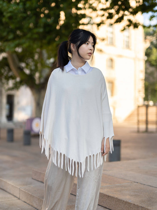 Poncho con frange morbido