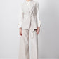 Completo smanicato con gilet cintura e pantaloni palazzo