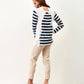 Maglia a righe con volant e cut-out sul retro