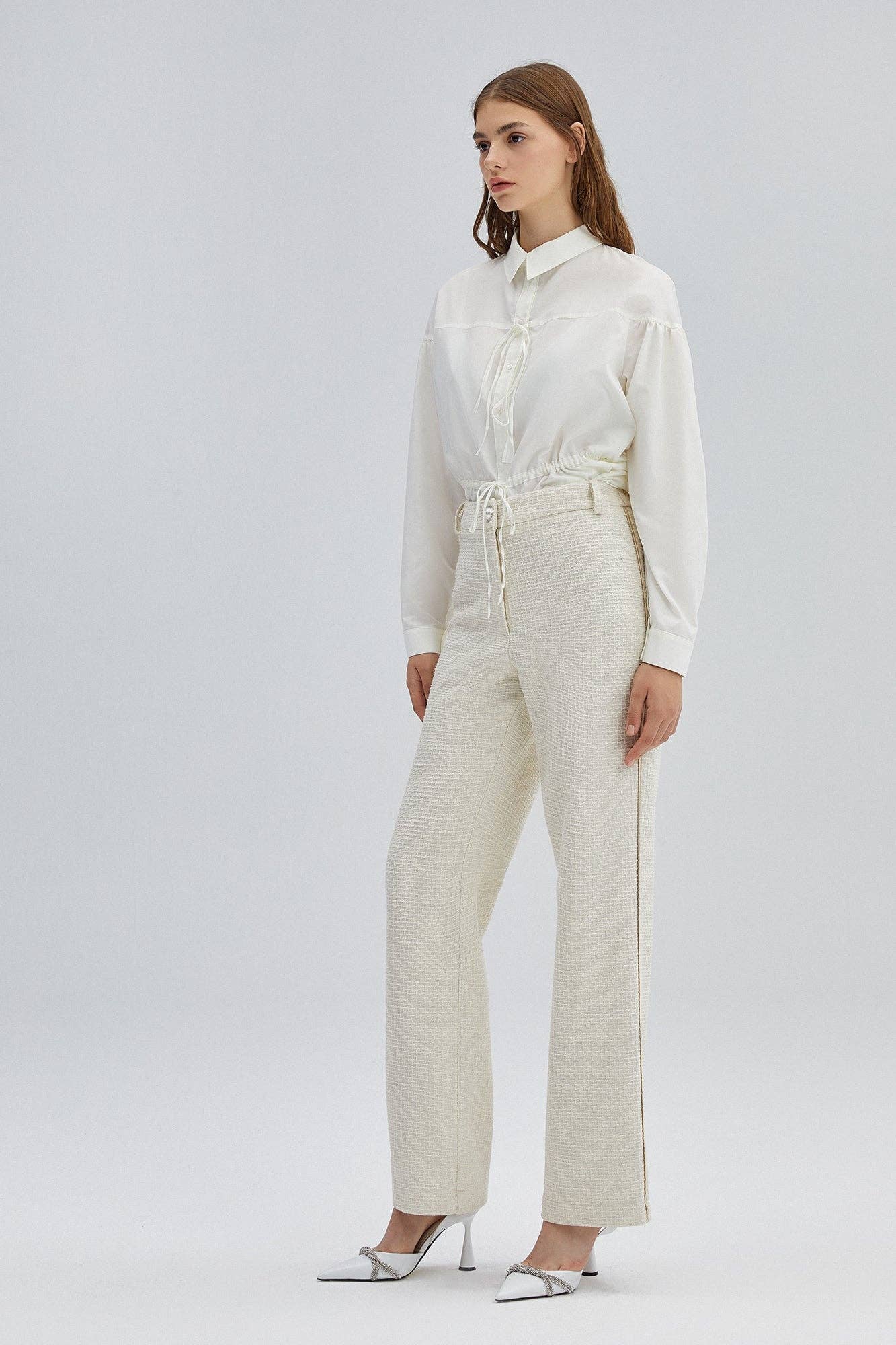 Pantaloni in tweed a vita alta color crema