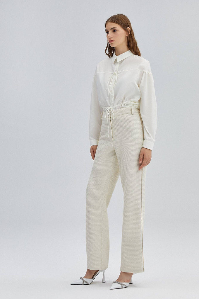 Pantaloni in tweed a vita alta color crema