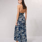 Abito lungo boho con top all’uncinetto e gonna floreale