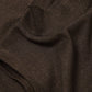 Top a collo alto con dettagli metallici