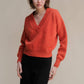 Maglione corto tweed con doppio scollo a V