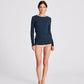 Top Thyra a maniche lunghe in cotone biologico a costine blu denim