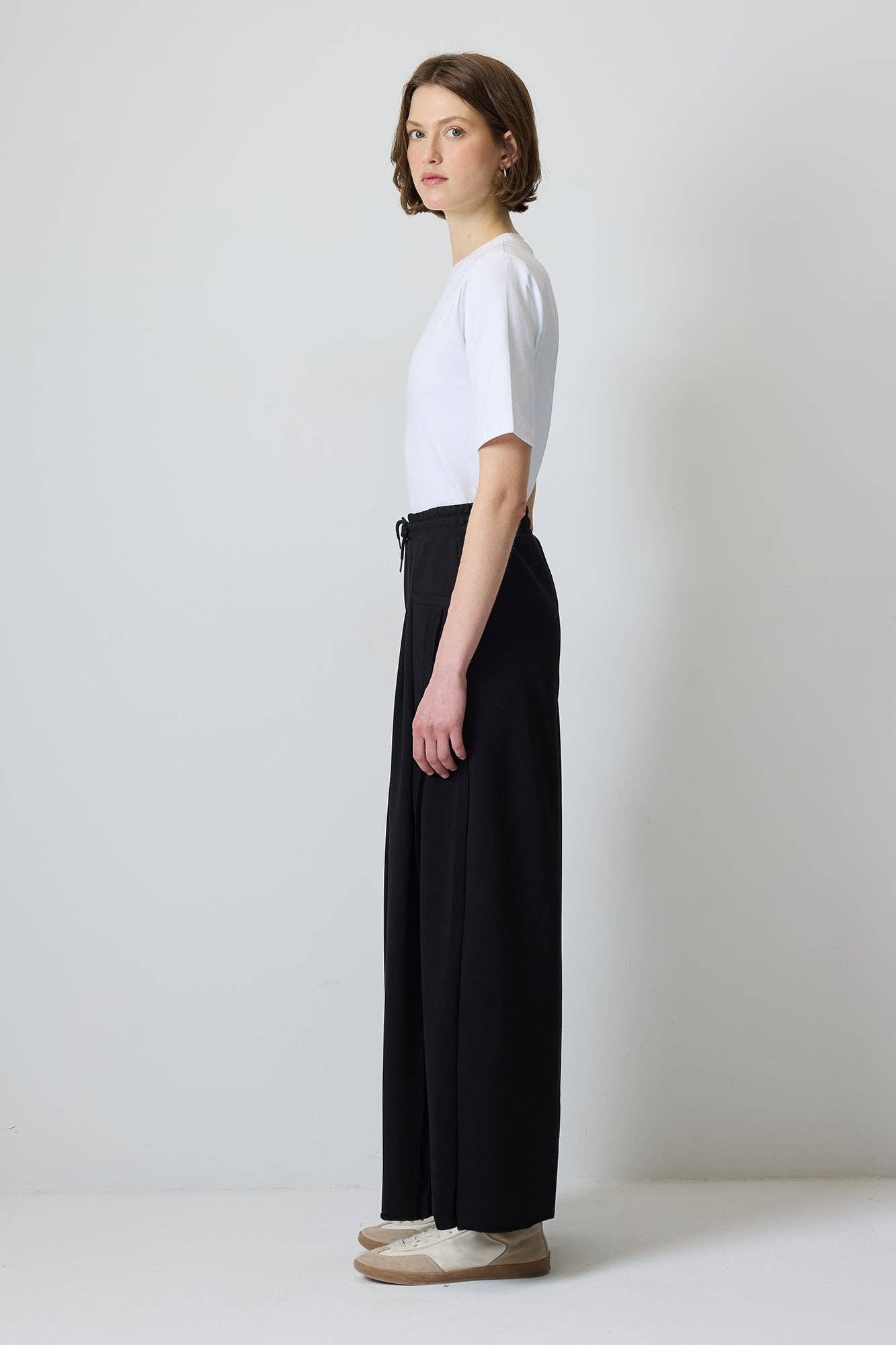 Pantaloni a palazzo con pieghe e coulisse