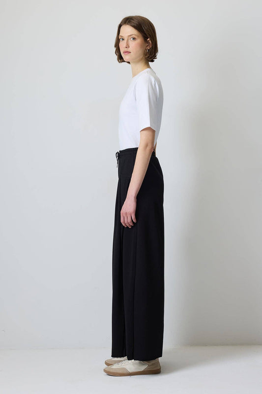 Pantaloni a palazzo con pieghe e coulisse