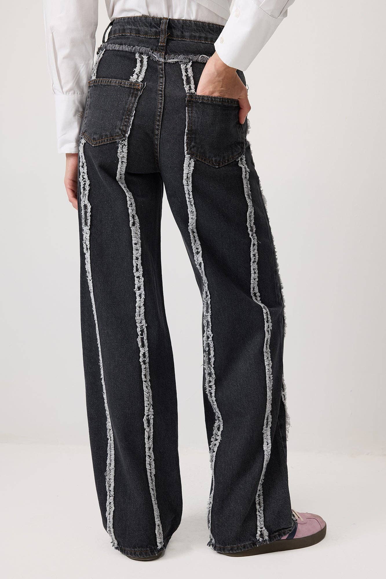 Pantaloni in denim con frange