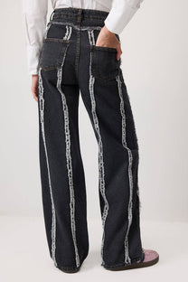 Pantaloni in denim con frange