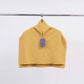 Poncho maglione in maglia a coste con collo alto